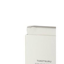 Load image into Gallery viewer, Top corner of Taketsuru Pure Malt presentation box with a visible crease on the flap