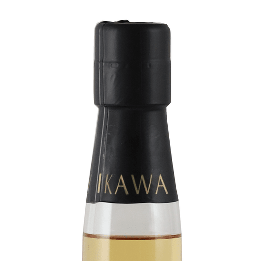 Black cap and neck of Ikawa Fauna 2025 bottle with gold Ikawa lettering