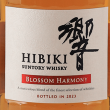 Load image into Gallery viewer, Straight-on detail of Hibiki Blossom Harmony 2023 front label with black calligraphy and red banner