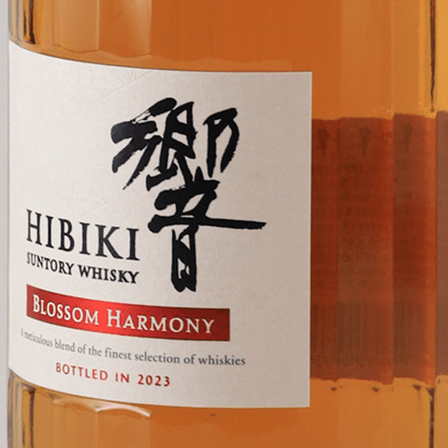 Hibiki Blossom Harmony 2023 curved front label and amber glass viewed from the opposite angle