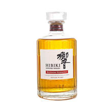Load image into Gallery viewer, Front view of the Hibiki Blossom Harmony 2021 bottle with amber whisky and a clear stopper