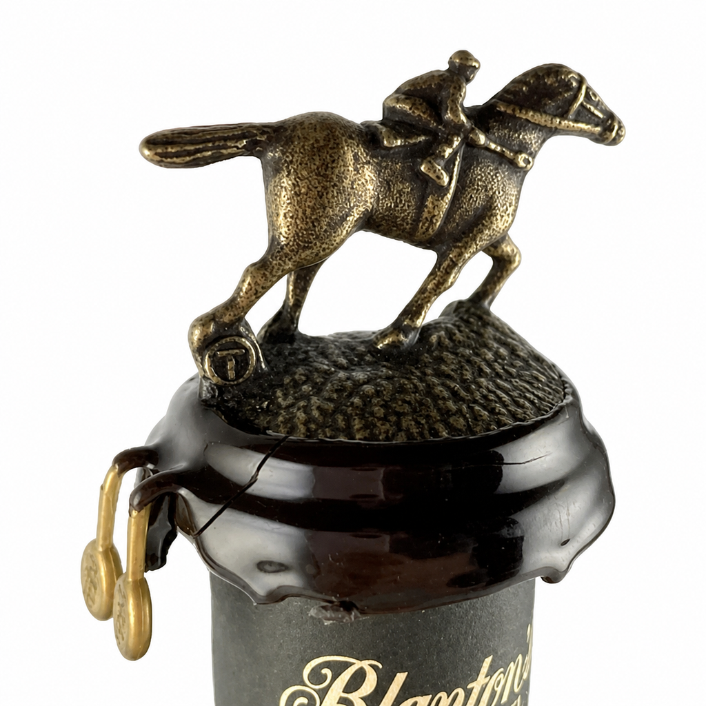 Blanton's Black single-barrel bourbon bottle and horse stopper