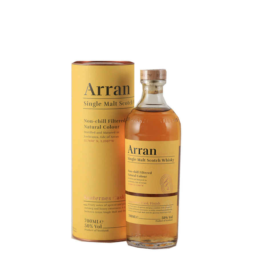 Arran Sauternes Cask Finish single malt whisky bottle beside its yellow presentation tube