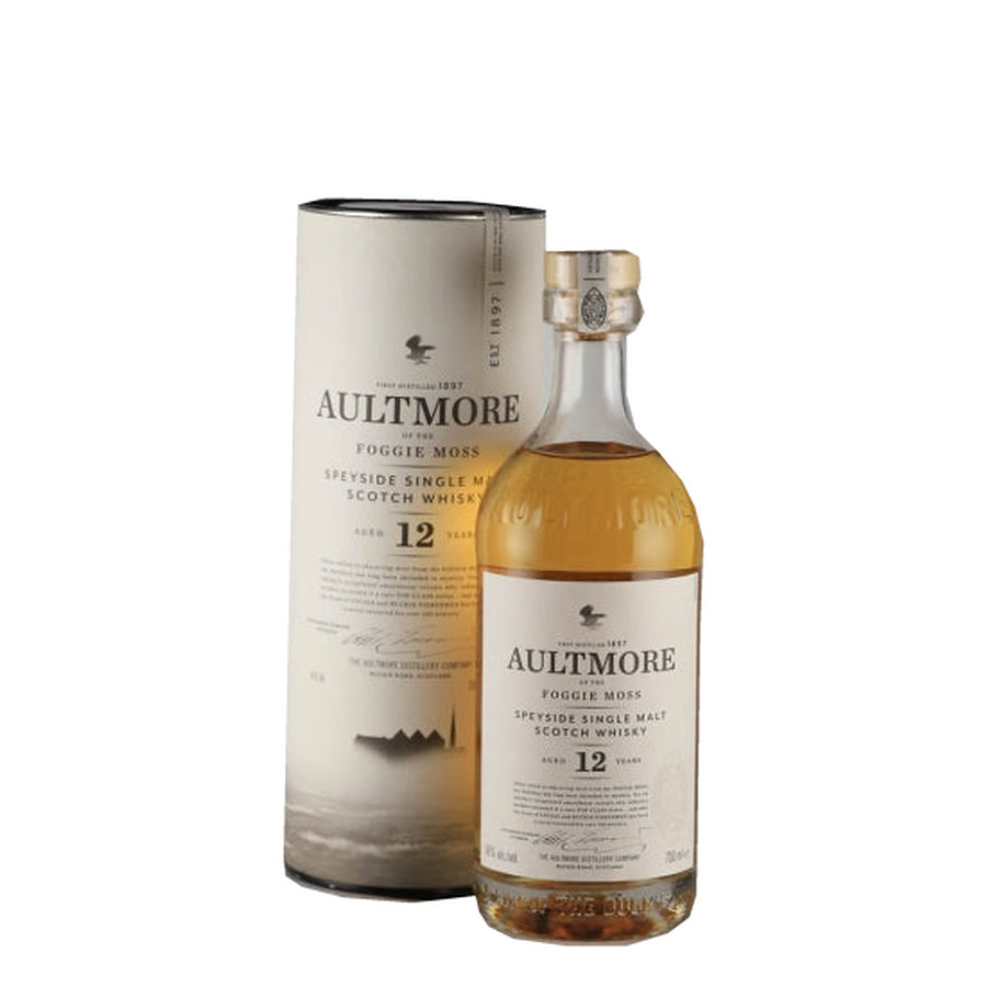 Aultmore 12 Year Old single malt Scotch whisky bottle beside its white presentation tube