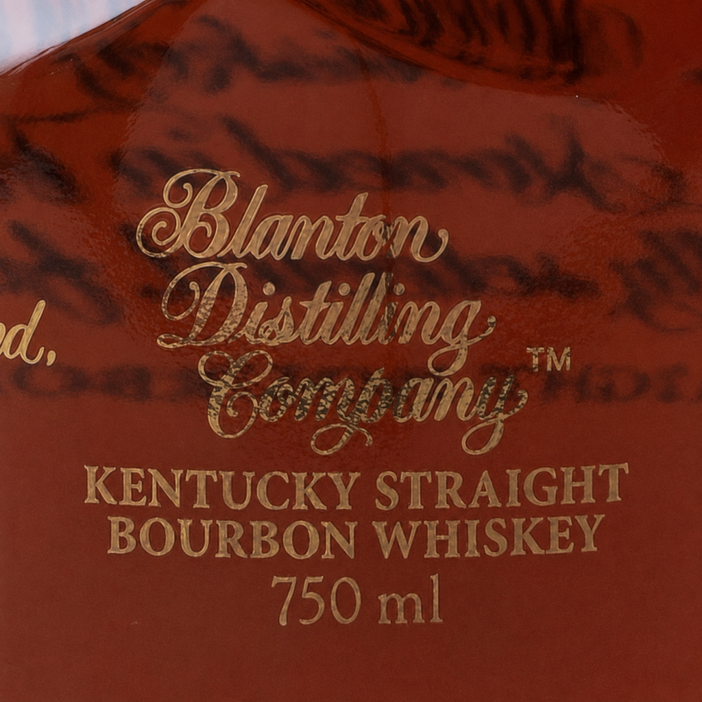 Detailed view of the Blanton’s Distilling Company branding and 750 ml bourbon bottle inscription.