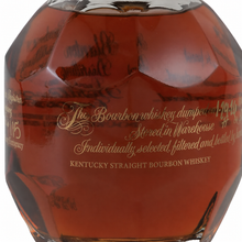 Load image into Gallery viewer, Front close-up of a Blanton’s bourbon bottle featuring faceted glass, amber whiskey and gold lettering.
