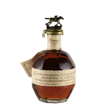 Load image into Gallery viewer, Front view of Blanton's Takara Red Japan Edition bourbon bottle with hanging tag and horse-and-jockey stopper