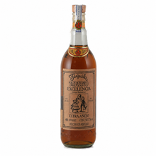 Load image into Gallery viewer, A bottle of Tequila Especial in a clear glass bottle showing the amber liquid inside, with a brown label and a silver cap, on a white background.