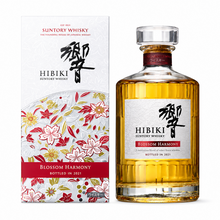 Load image into Gallery viewer, Hibiki Blossom Harmony 2021 bottle beside its red, white and gold floral presentation box
