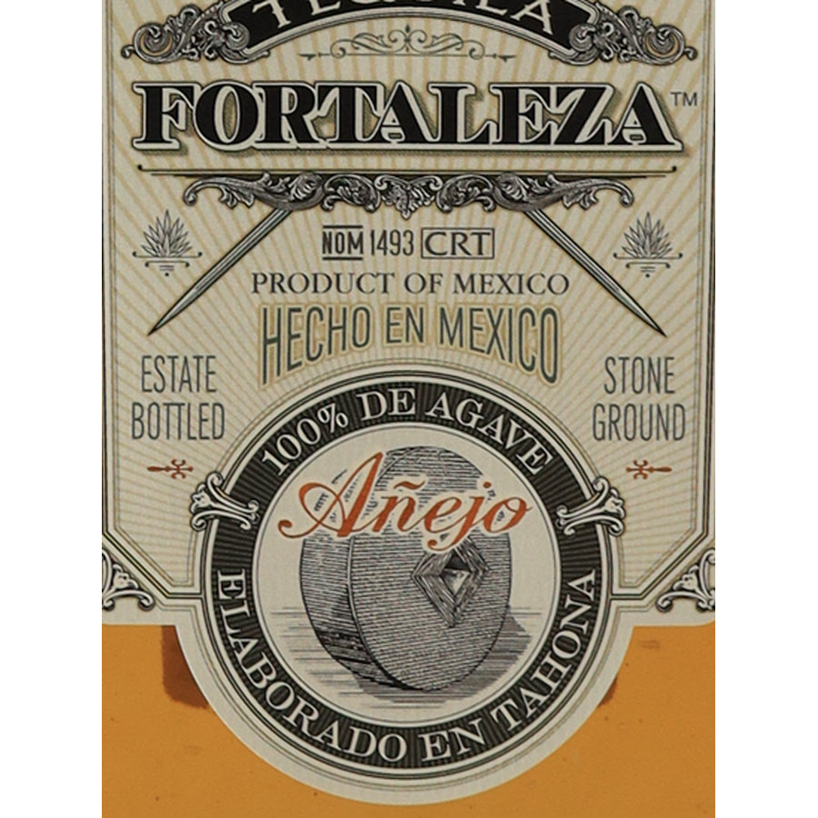 Fortaleza Anejo tequila, Anejo and 100% agave label detail