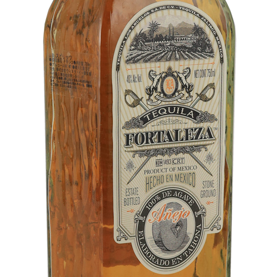 Fortaleza Anejo tequila, left angle of the front label