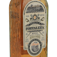 Load image into Gallery viewer, Fortaleza Anejo tequila, left angle of the front label