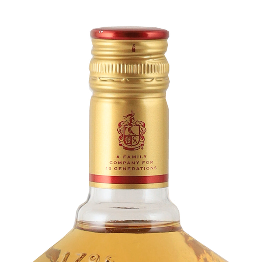 Jose Cuervo Especial Reposado tequila, gold cap and neck detail