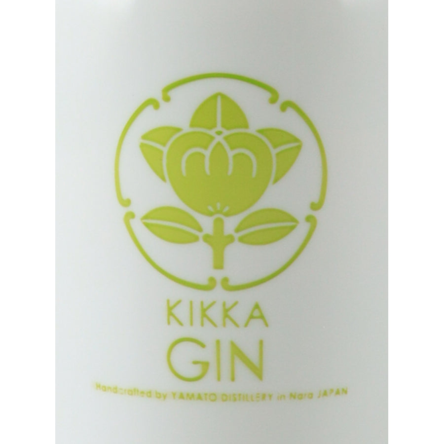 Kikka Gin Ruten green botanical emblem and Yamato Distillery lettering, front close-up