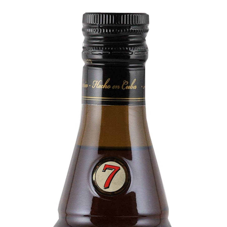 Legendario Elixir de Cuba 7 Year Old black cap and neck with red number 7 emblem