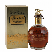 Load image into Gallery viewer, Blanton’s Gold Edition single barrel bourbon whiskey bottle with its gold presentation box.