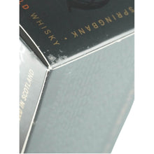 Load image into Gallery viewer, Springbank 10 Year Old single malt whisky close-up showing wear on a presentation box corner