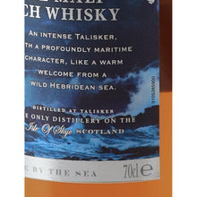 Load image into Gallery viewer, Talisker Storm single malt Scotch whisky label detail showing the 70cl volume marking