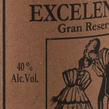 Load image into Gallery viewer, Close-up of a brown paper label with black printed text reading 'EXCELEN.