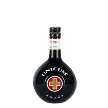 Load image into Gallery viewer, Zwack Unicum 700ml herbal liqueur in a round black bottle with red and gold cross